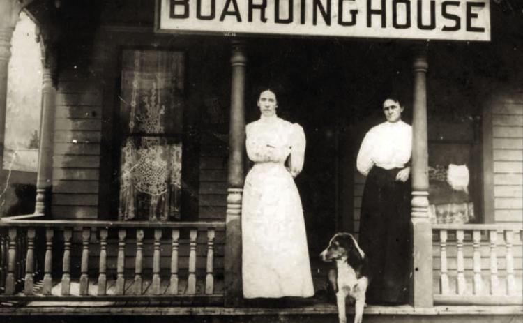 Mrs. O.M. Huff and boarding house helper Miss Telir on the porch of the boarding house in Eureka that Mrs. Huff operated under lease from “Preacher” Condit. the photo was believed taken between 1902 and 1908. Photo courtesy of San Juan County Historical Society