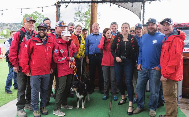 SAR Team member from around the State pose with Governor Polis Photo Credit/Jim Donovan