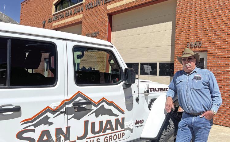 Photo by DeAnne Gallegos Mike Maxfield standing by his new Jeep.