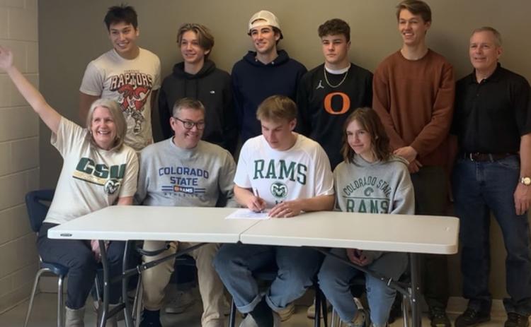 Paton signing with CSU with his track team, coach Roger Carlson, mom &amp; dad Jane &amp; Anthony Edwards &amp; sister Amelia. Photos provided by the Edwards Family