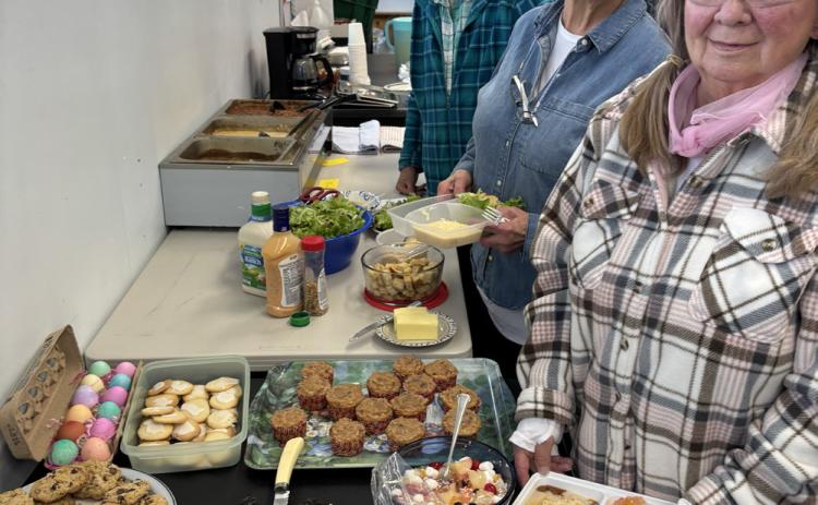 The winter’s senior weekly lunch program has wrapped up for the season. L-R Claudia Moe, Rose Raab, Betty Chavez, and Mary Lou Phillips photo by Becky Joyce
