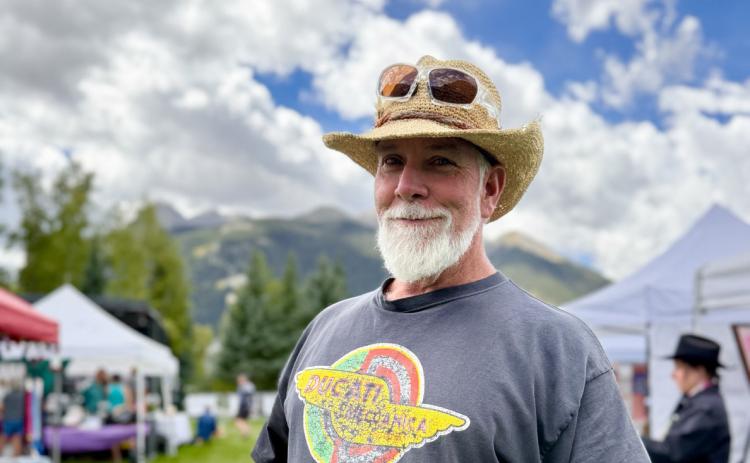 Bruce Conrad enjoying the art festival last weekend photo by DeAnne Gallegos