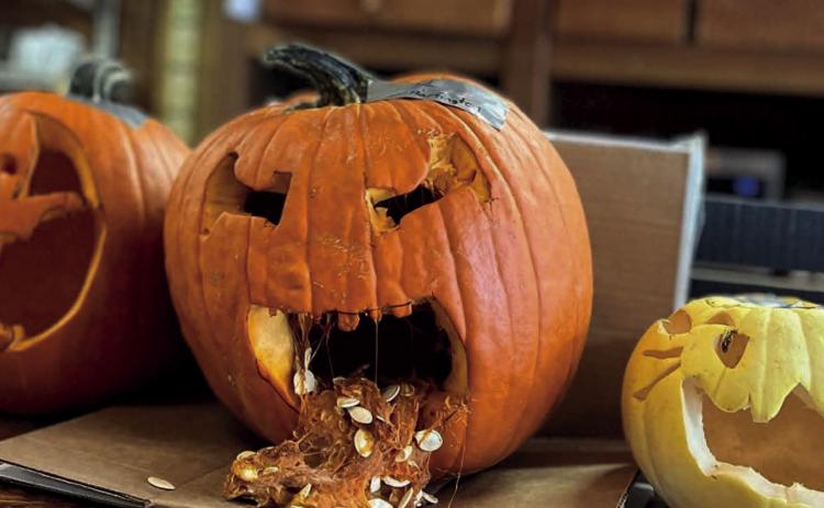 Getting creative while carving pumpkins. Photo courtesy of Silverton Area Chamber of Commerce