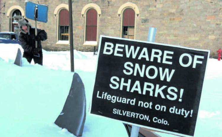 Mark Esper/Silverton Standard &amp; the Miner 10 Years ago -From the 12.12.13 Issue of The Silverton Standard and Miner . Melanie Bergolc of Silverton uses her snow shovel to club a “snow shark” at the Iron Horse pocket park at 12th and Greene streets in downtown Silverton after last week’s storm.