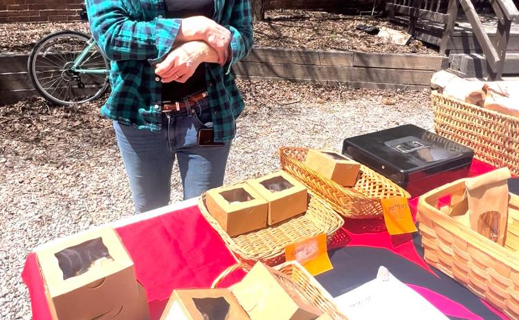 Photo credit DeAnne Gallegos The Silverton Farmers Market kicked off this weekend in the courtyard of the Wyman Hotel Deborah Roberts offered her freshly baked good.