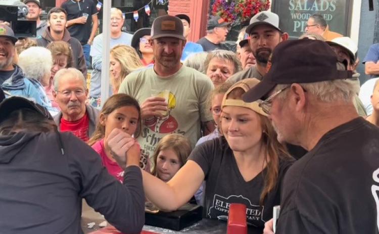 Silverton’s Kim xx beat Silverton’s Daley xx in arm wrestling. Photo credit DeAnne Gallegos