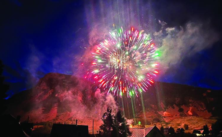 The fireworks burning bright above town Photo by Jamilynn Kaiser (Smith)
