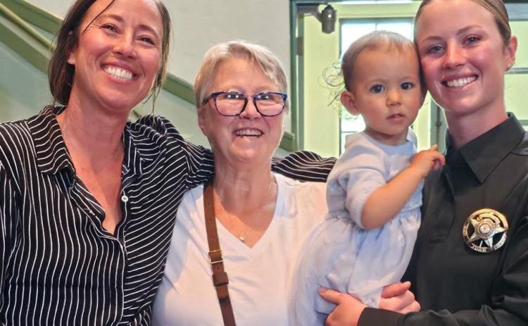 Four generations came together to celebrate Meah Mordecai’s police academy graduation photo by Carson Mordecai
