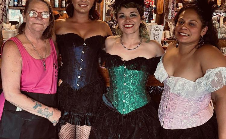 The Shady Lady Saloon, located at 12th & Blair St, has reopened for the summer season. “Handlebar Holly” to the far left is the new owner.