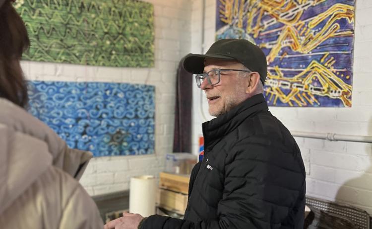 Longtime local and resident artist Phil Antonelli discussed his art medium during the tour and also sits on the Silverton Powerhouse non-profit board. Photo credit DeAnne Gallegos
