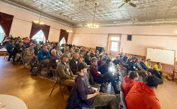 Town hall meeting room was standing room only during a general session course Photo by Kathy Holland