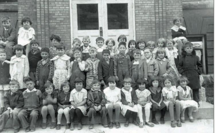 Young Silverton School students at the Snowden Street entrance to the school, probably in 1928. Photo courtesy of San Juan County Historical Society SILVERTON STUDENTS, 1928