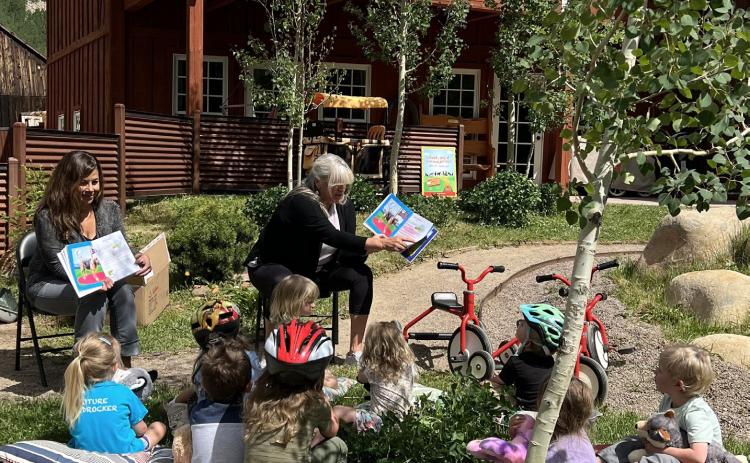 SFLC is a lifeline to many local families in the workforce In summer of 2023, local author Nancy Brockman and illustrator Lisa Morales read their children’s book Naughty Dogs to the preschoolers. Photo credit DeAnne Gallegos