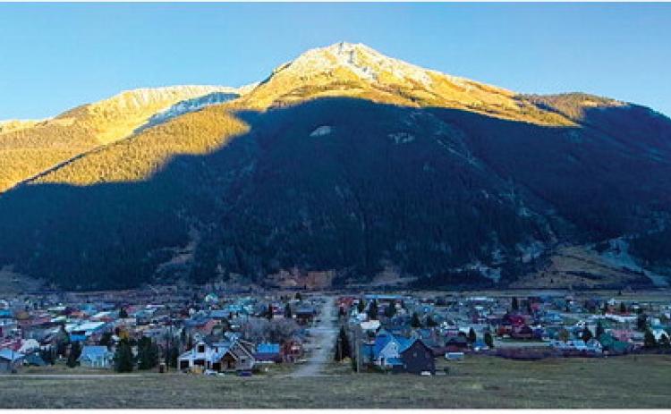 Days are getting shorter and colder in Silverton as Fall moves along through October. This is 5:45pm on Tuesday and the sun has already set behind Sultan &amp; Turk mountains casting a shadow over Kendall Mountain. Photo by DeAnne Gallegos