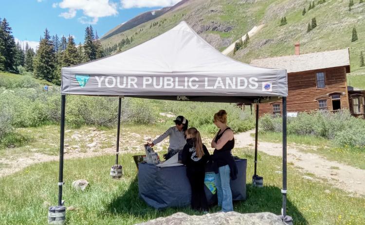 SJMA Alpine Ambassador, Adela Pizarro Conte, provides updates on conditions and provides an overview of the Alpine Loop to some of the many visitors she encounters at Animas Forks during summer weekend