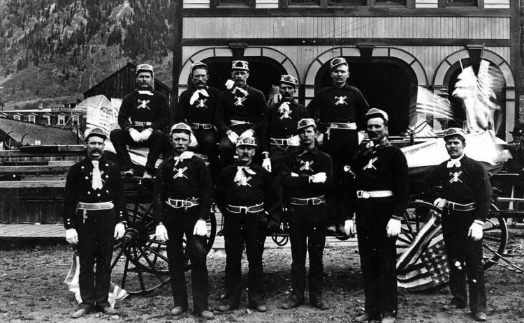 The Silverton Volunteer Fire Department posed in front of the old Town Hall on Blair Street on July 4, 1891. The San Juan County Historical Society is seeking old photos of the building, particularly showing the upper front of the structure, for a historical assessment. If you have one, please send it to Bev Rich, bevrich@frontier. net or call 387-5781. Photo: San Juan Historical Society