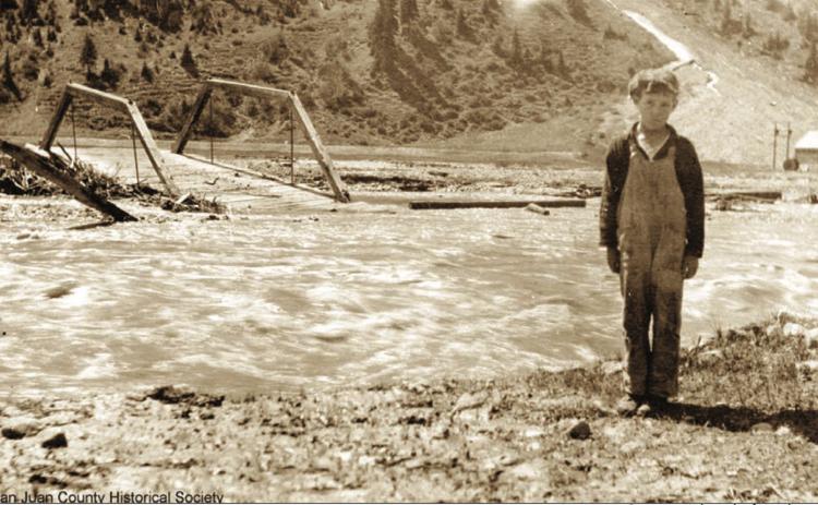 ABOVE: The Animas River Bridge on 14th Street in June 1921 after being washed out in high water, with Donald Clifford on the bank. BELOW: The Animas River bridge at Howardsville, washed out by 1921 spring high water. Taken looking easterly from the west bank. One of the structures in the rear may be the old cabin of George Howard. San Juan County Historical Society photos