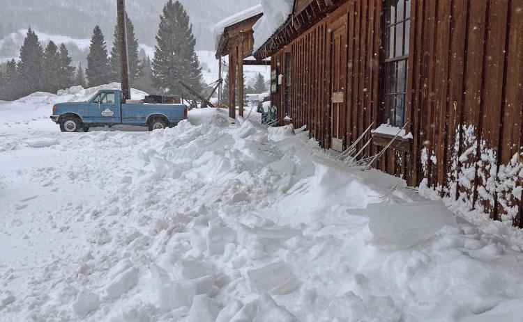 Photo credit Scott Fetchenhier Fallen snow off the Mining Heritage Museum roof, watch out for roof avalanches as they start to occur during warming periods.