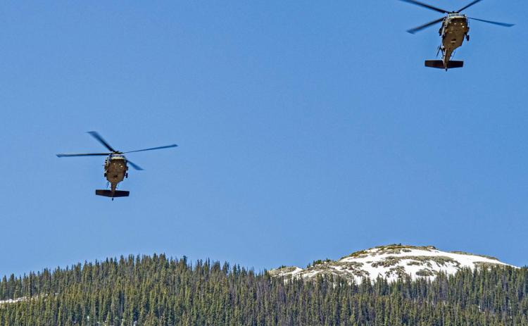 Two Colorado Air National Guard helicopters fly over Silverton at noon on Memorial Day, May 25. More photos, Page 7.