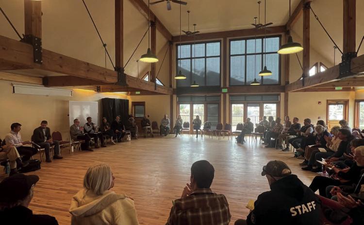 Room full of locals at Kendall Mountain Community Center listening to Attorney General Weiser. Photo credit DeAnne Gallegos