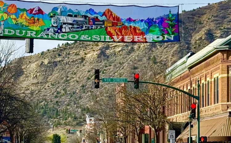 (TOP) photo by DeAnne Gallegos Downtown Durango shares some love for Silverton on a new banner crossing Main Street
