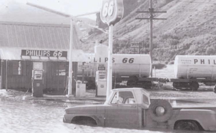 The Phillips 66 station at the wye is pictured during the flood of September 1970. Standing on the back of the truck is Jim Melcher. Photo courtesy of San Juan County Historical Society
