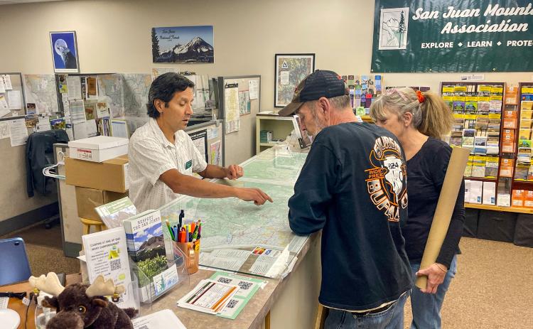 Shoppers at at SJMA bookshop. Photo credit SJMA