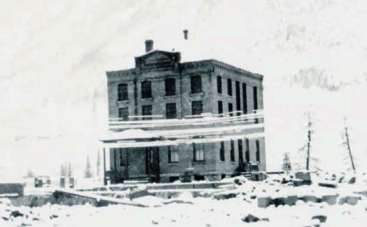 The San Juan County Jail in 1906. Snow covered telephone wires run along Greene Street. Photo: From the San Juan County Historical Society archives.
