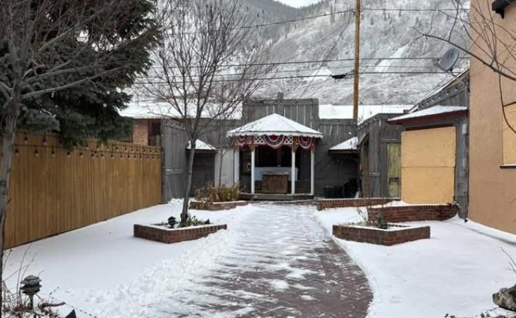 Fresh snow on the Natalias restaurant patio makes for a peaceful and quiet scene on Blair Street . Photo by Melanie Bergolc