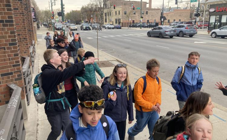 The middle schoolers on a busy Chicago street Natalie Platt and Carl Schnitker.