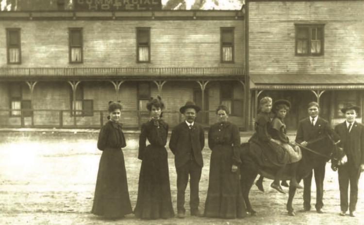 Anton A. Saenger and his family in front of the Commercial Hotel they operated on Mineral Street, with Kendall Mountain in the background, around 1905. From left are Marie Saenger (mother of Stanley Fisher, who donated this photo to the historical society), Florence Saenger, Anton Saenger (1857-1913), Mary Saenger (1860-1909), Bertha “Anna” Saenger (on burro), Emma Saenger (on burro), Sylvester Saenger, and Anton (Tony) Saenger. Photo courtesy of San Juan County Historical Society