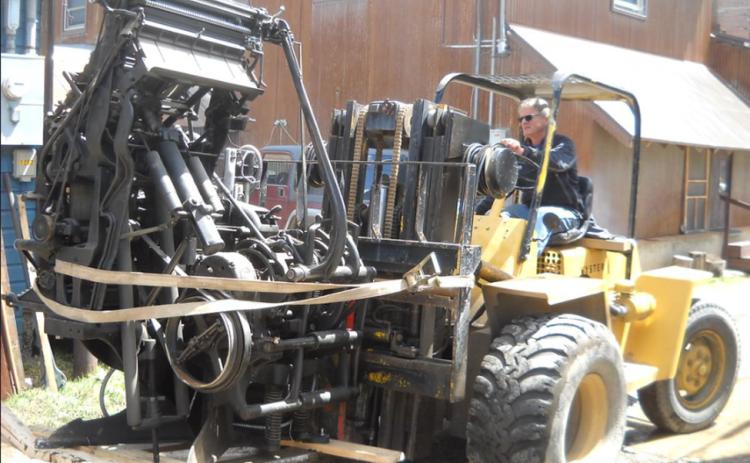 In May of 2017, Ken Safranski is shown with the Museum’s Model 8 Linotype loaded after being rolled out from the former Silverton Standard building on Greene Street.
