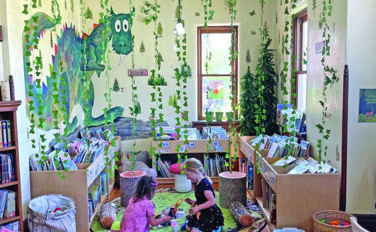 Kids playing in the new children’s reading room at the Silverton Library Photo credit Katey Fetch