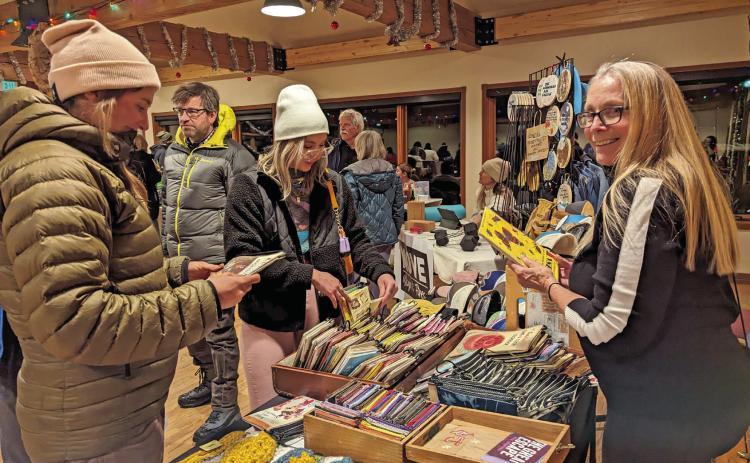 Photo credit Silverton Creative District Kathy Laskey selling her handmade Haiku Moving Co goodies at the Mistletoe Market.