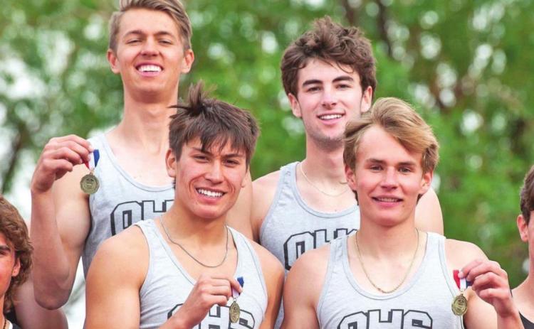 Edwards (bottom right) is pictured with his 4x400 teammates Hayden Hart, Justin Bessera, and Canyon Ishikawa. Photo Credit David Emory
