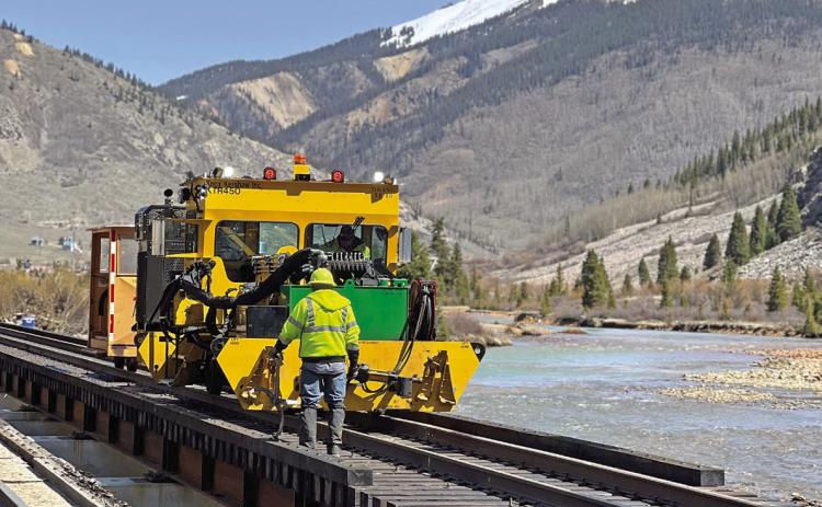 Final alignment happening just before the arrival of the steam train. Photo credit DeAnne Gallegos
