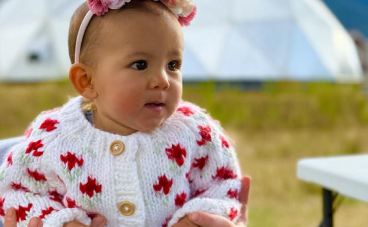 Photo by DeAnne Gallegos Silverton Baby Katrina celebrates her first Silverton fall season with her mom, Meah Mordeci, by wearing a little unicorn hat and a fall sweater.